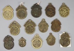 China, 14 bronze pendant charms or amulets, Qing dynasty, 47-55mm, F to VFCONDITION: Provenance -