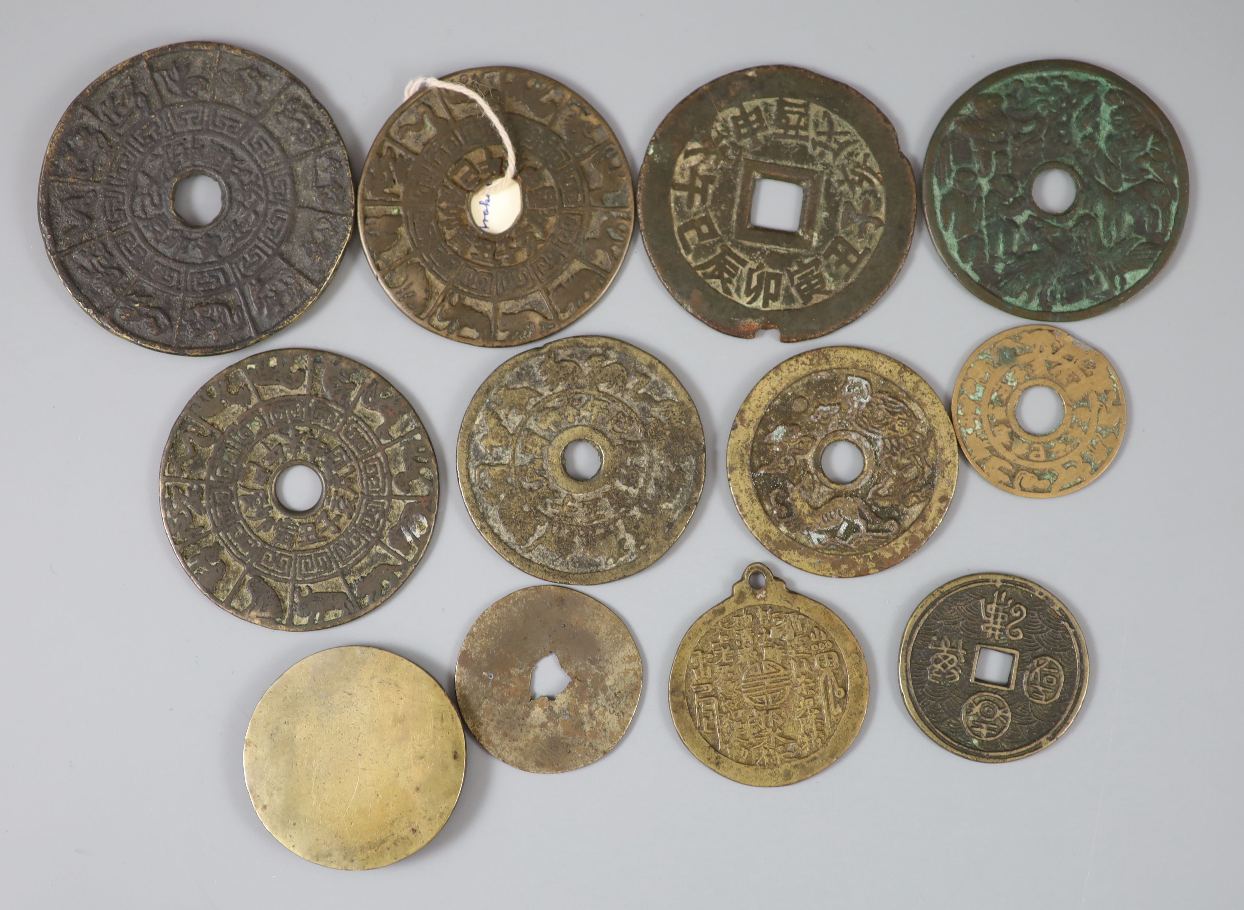 China, 12 bronze charms or amulets, Qing dynasty, to include eight zodiac charms, rev. pictorial, - Bild 2 aus 2