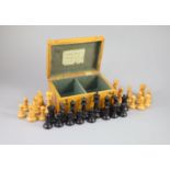 A Jaques & Son Staunton 3 1/2" boxwood and weighted chess set in original golden oak box, c.1910,