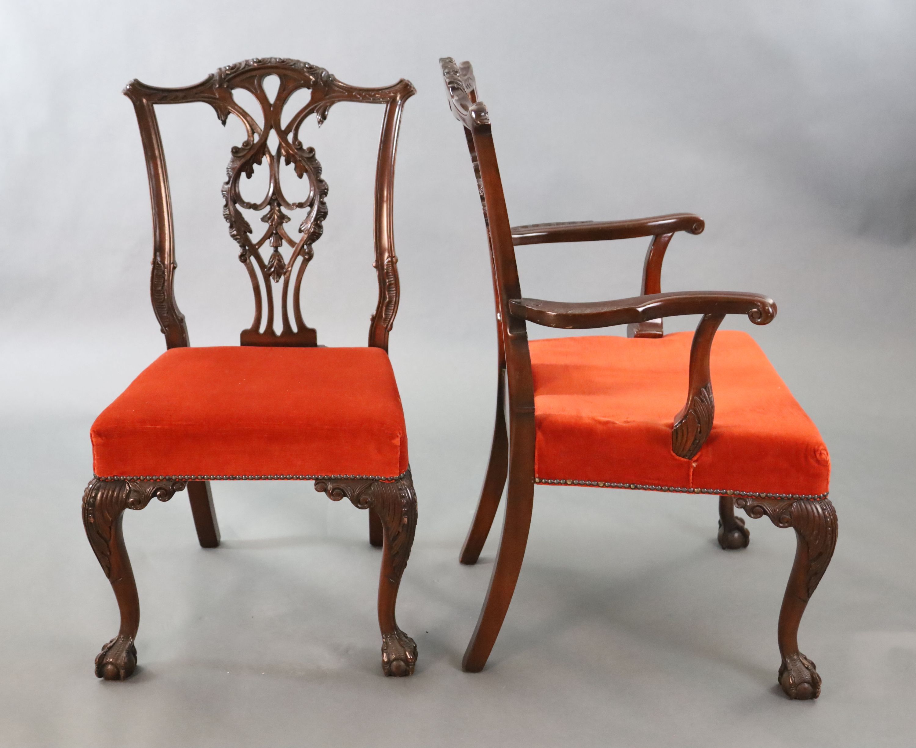 A set of eight Chippendale Revival mahogany dining chairs, including a pair of carvers, with