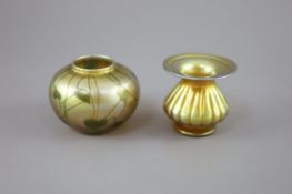 A Tiffany vine leaf pattern favrile iridescent glass vase and a Tiffany favrile lobed vase, early