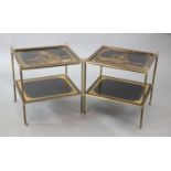 A pair of French brass and chinoiserie black lacquered two tier occasional tables, decorated with