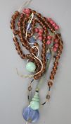 A Chinese glass bead court necklace, Chaozhu, late Qing dynasty, the beads simulating amber and