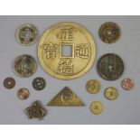 China, a group of 14 bronze and brass coin charms or amulets, Qing to Republic period, F to VF to