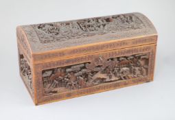 A large Chinese carved sandalwood box, 19th century, the domed top and sides carved in high relief