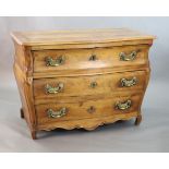 A 19th century Continental walnut serpentine commode, fitted three long drawers with brass loop