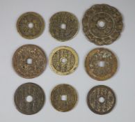 China, 9 bronze charms or amulets, Qing dynasty, seven obv. magical spell characters, rev. Eight