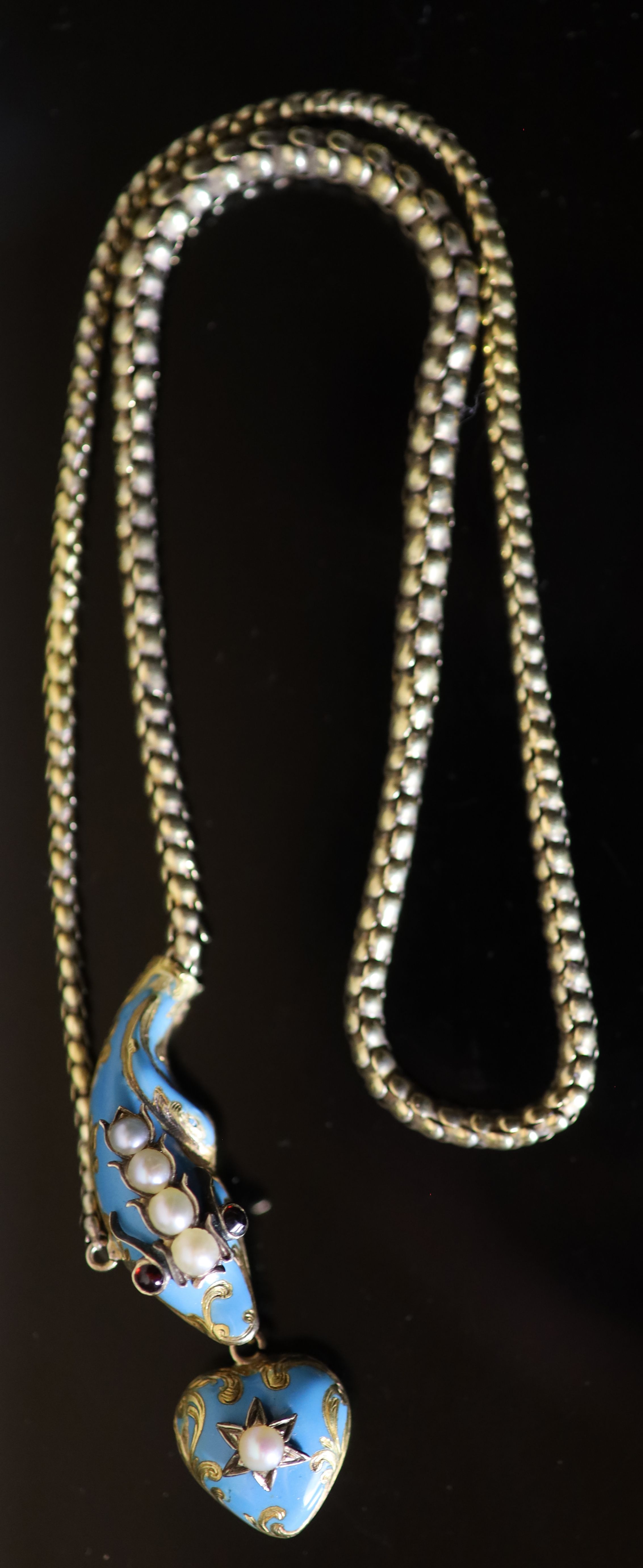 A Victorian gold, enamel, split pearl and cabochon garnet set serpent necklace, with heart shaped - Image 2 of 3