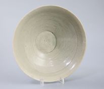 A Chinese celadon bowl, Song-Yuan dynasty of conical form, the interior incised with foliage, 18.2cm