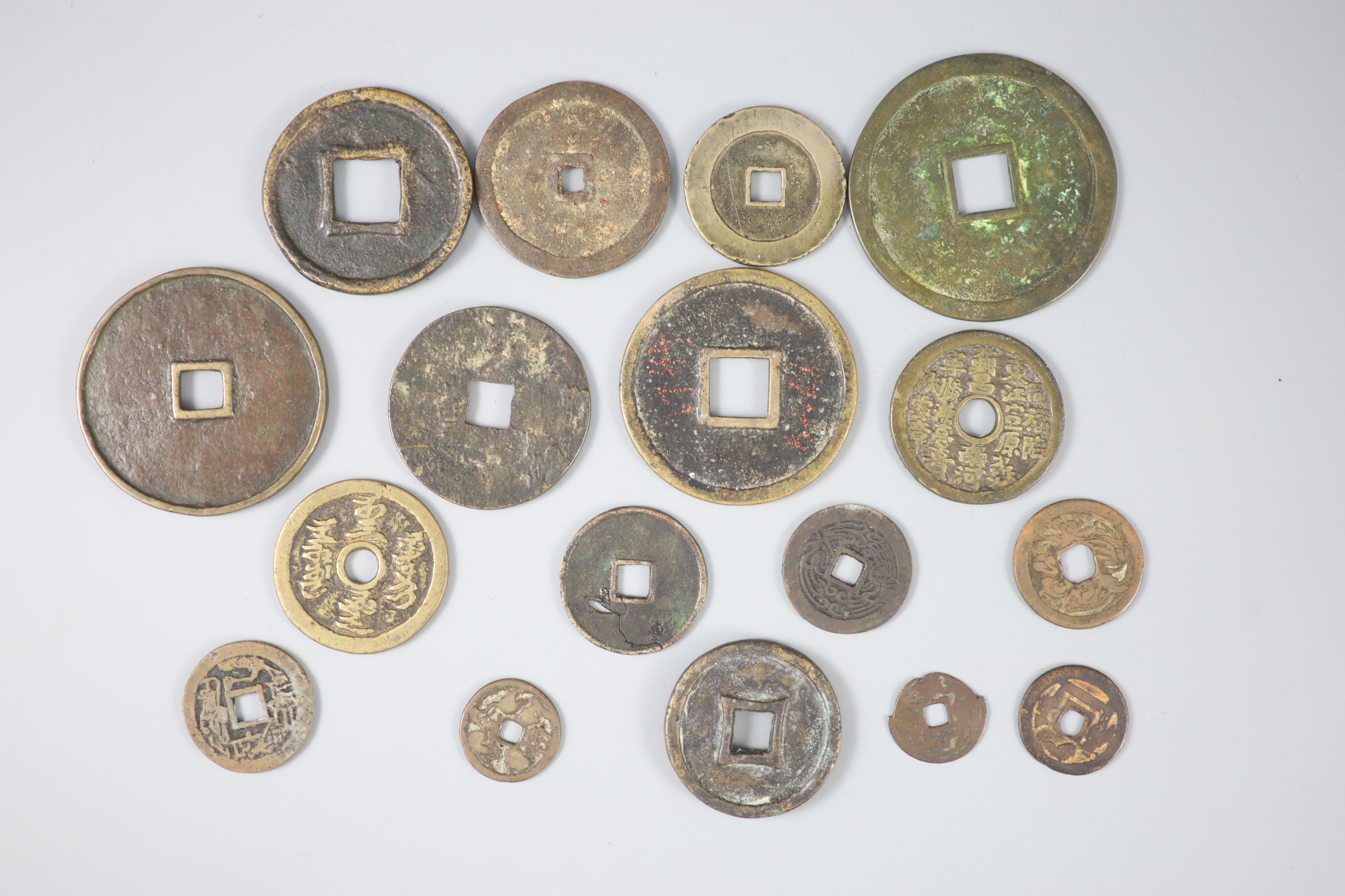 China, a group of 17 bronze or copper inscribed charms or amulets, Qing dynasty, nine with - Bild 2 aus 2