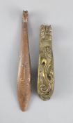 A Chinese archaistic silver and copper inlaid bronze belt hook and a bronze 'chilong' belt hook,