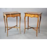 A pair of Louis XVI style ormolu mounted marquetry work tables, with serpentine rectangular tops, on