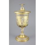A late 19th/early 20th century German parcel gilt 800 standard presentation pedestal cup and