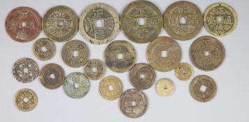 China, a group of 22 bronze or copper coin charms, Qing dynasty, each inscribed 'Zheng De Tong bao',