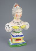 A rare Staffordshire pottery bust of Queen Adelaide, c.1831, on a polychrome enamelled rectangular