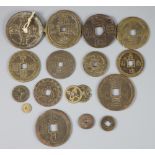 China, 17 bronze or copper charms or amulets, Qing dynasty, ranging from 18mm-54mm, VG - VF,