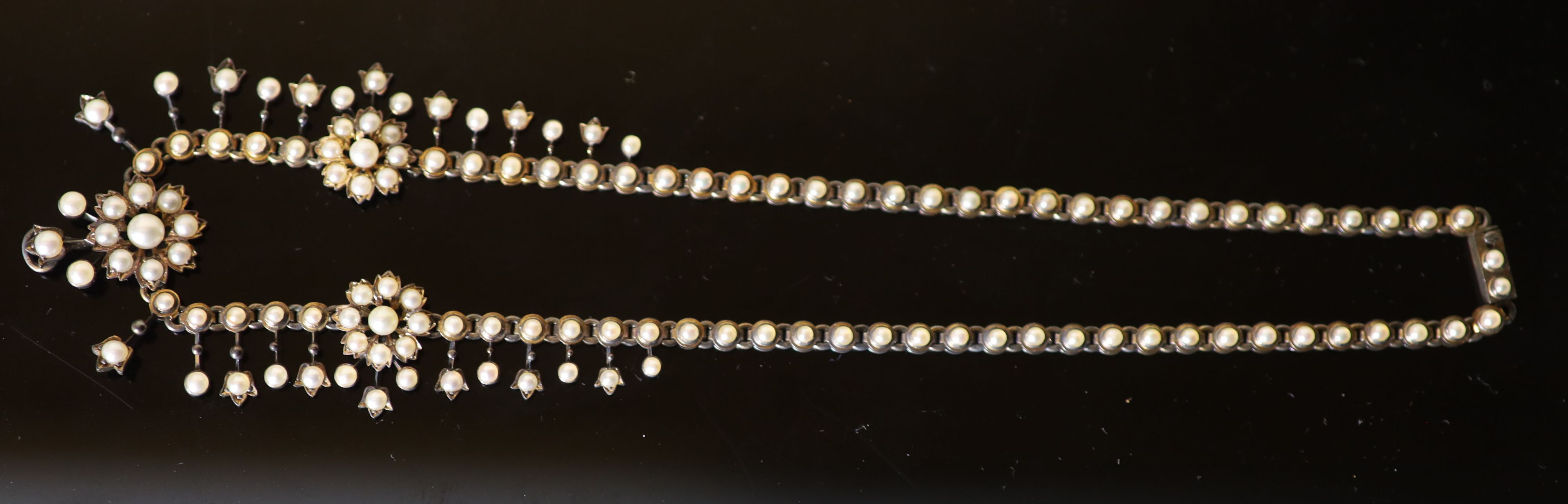 An Edwardian gold and pearl set necklace, lacking pendant attachment, 40cm, gross weight 30 grams. - Image 2 of 3