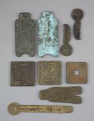 China, 9 large bronze charms or amulets, Qing dynasty-20th century three of spade form, 92-102mm,