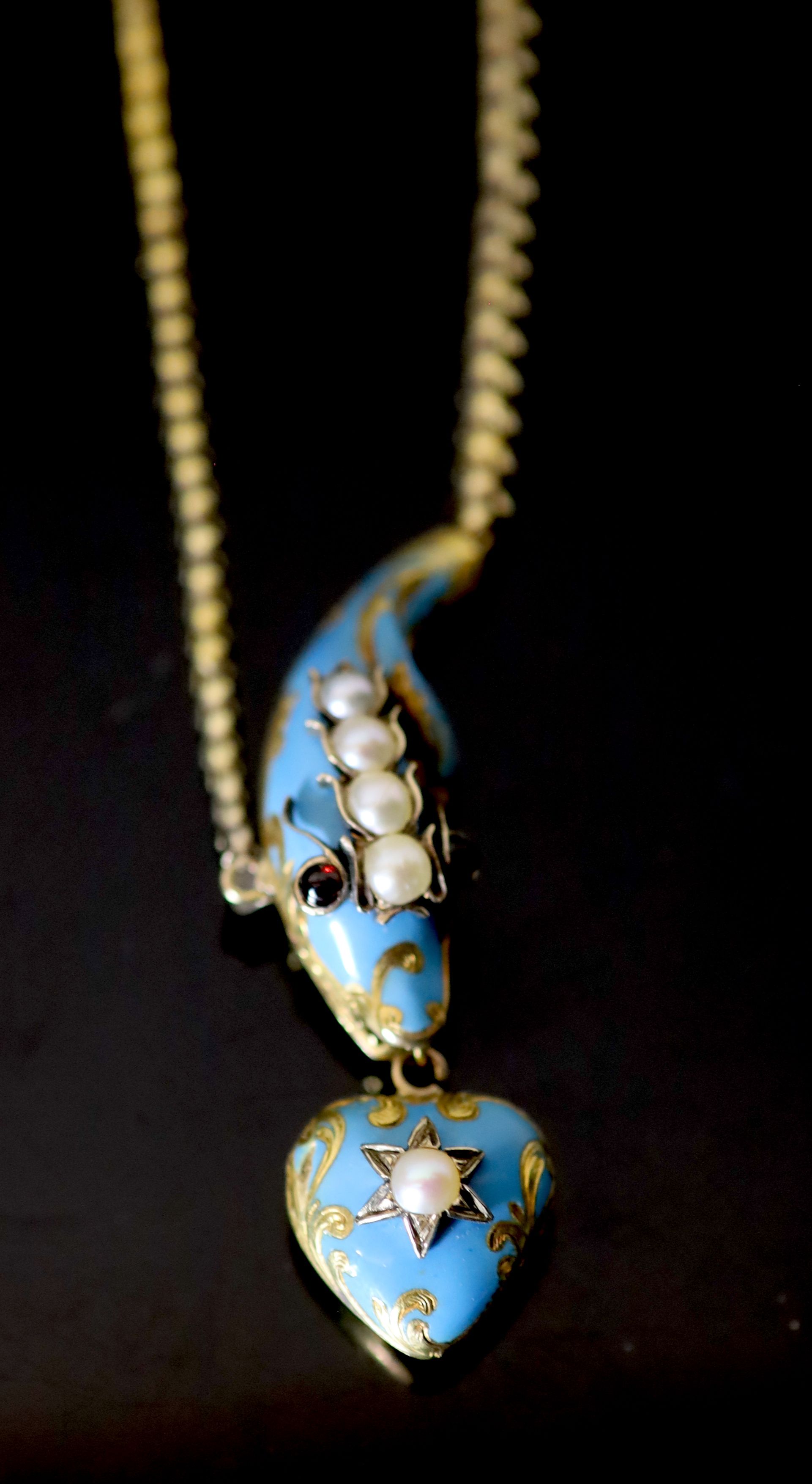 A Victorian gold, enamel, split pearl and cabochon garnet set serpent necklace, with heart shaped