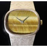 A gentleman's 1970's 9ct gold Bueche Girod manual wind dress wrist watch, on a 9ct gold bracelet,