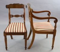A set of ten William IV mahogany dining chairs including two carvers, with scroll carved frames