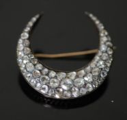 A 19th century French gold and foil backed graduated rose cut diamond set crescent brooch, 41mm,