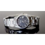 A gentleman's early 1970's stainless steel Rolex Oysterdate boy's? size wrist watch, with black dial