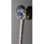 A Victorian gold mounted diamond set labradorite? stick pin, carved as the head of an ape, 78mm,