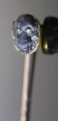 A Victorian gold mounted diamond set labradorite? stick pin, carved as the head of an ape, 78mm,