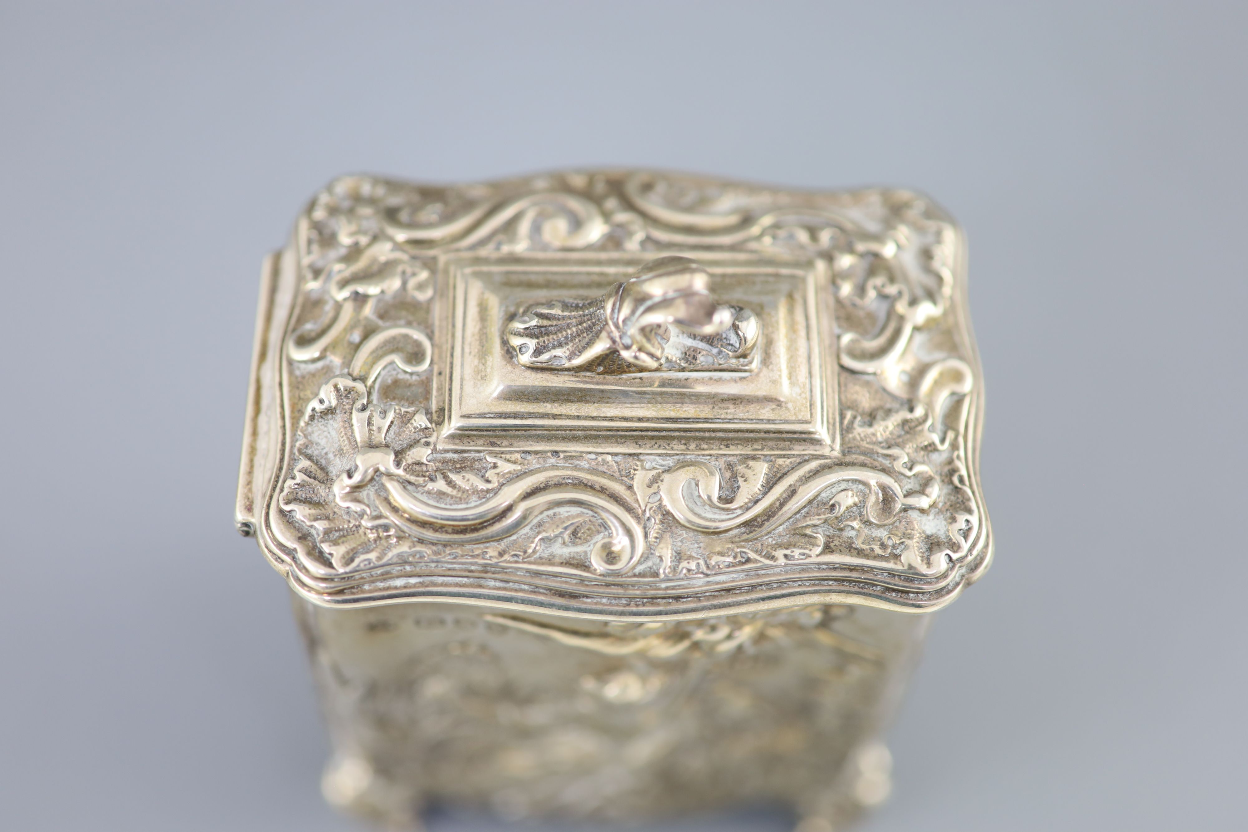 A late Victorian silver rococco style tea caddy by George Fox, of rectangular form and embossed with - Image 5 of 6