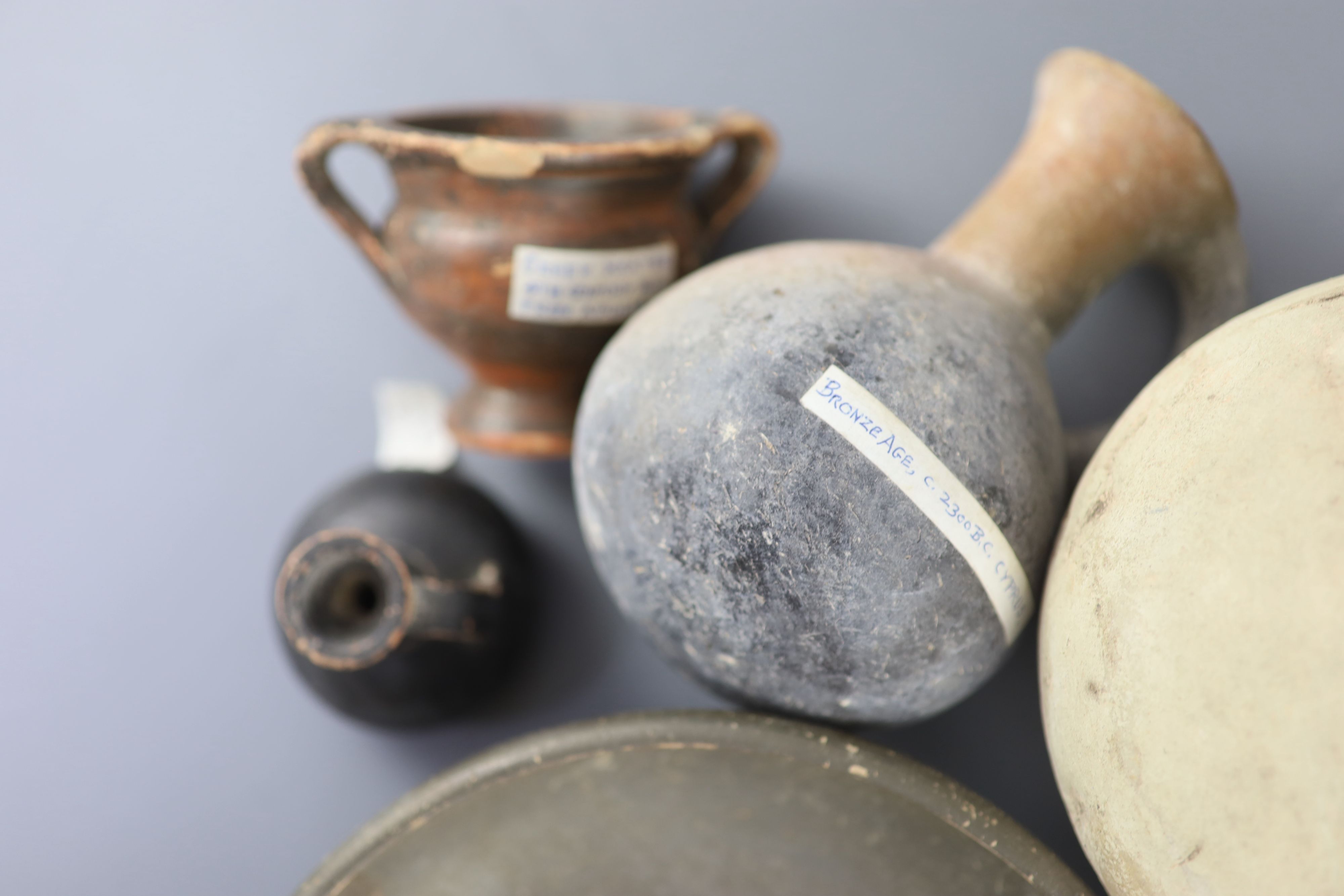 A group of Ancient Greek pottery vessels, Attic and Apulia, 4th-5th century BC, most with old - Image 4 of 7