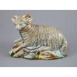 A Ralph Wood the Younger polychrome pottery figure of a Ram, c.1780-90, on a hollow naturalistic