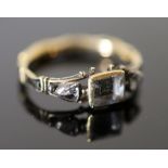 An early George II gold, rock crystal rose cut diamond and black enamel memento mori ring, the