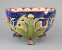 A rare William De Morgan lustre bowl, c.1890, decorated by A. Farini, Fulham period, the exterior