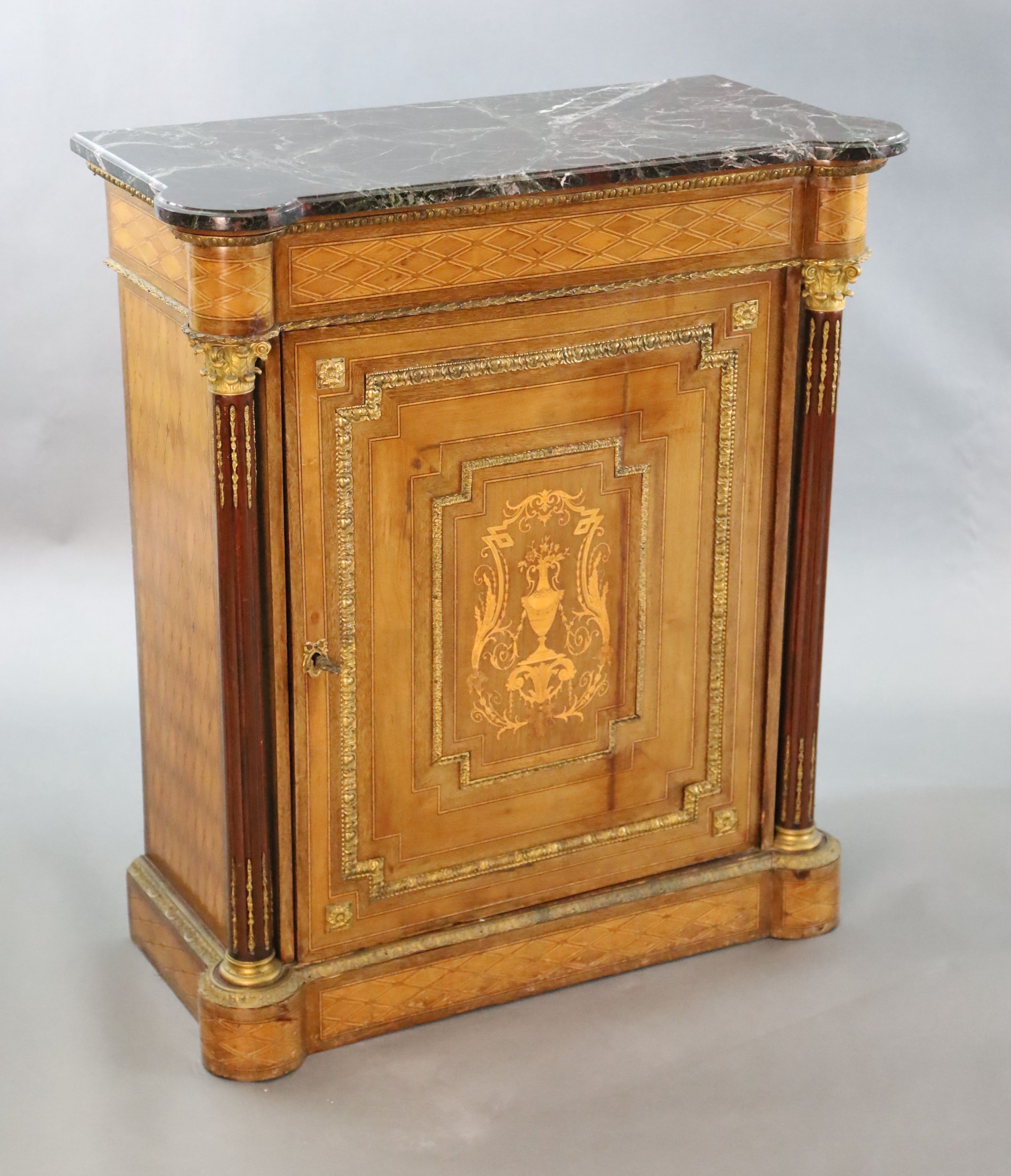 A 19th century French ormolu mounted, walnut and marquetry Meuble d'appoint, with purple and red