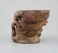 A Chinese bamboo root 'pine' libation cup, 17th/18th century, carved in high relief and openwork