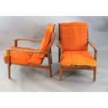 A pair of mid century Danish teak armchairs, with original burnt orange fabric upholstery, W.2ft 2.