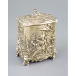 A late Victorian silver rococco style tea caddy by George Fox, of rectangular form and embossed with