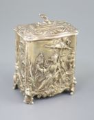 A late Victorian silver rococco style tea caddy by George Fox, of rectangular form and embossed with