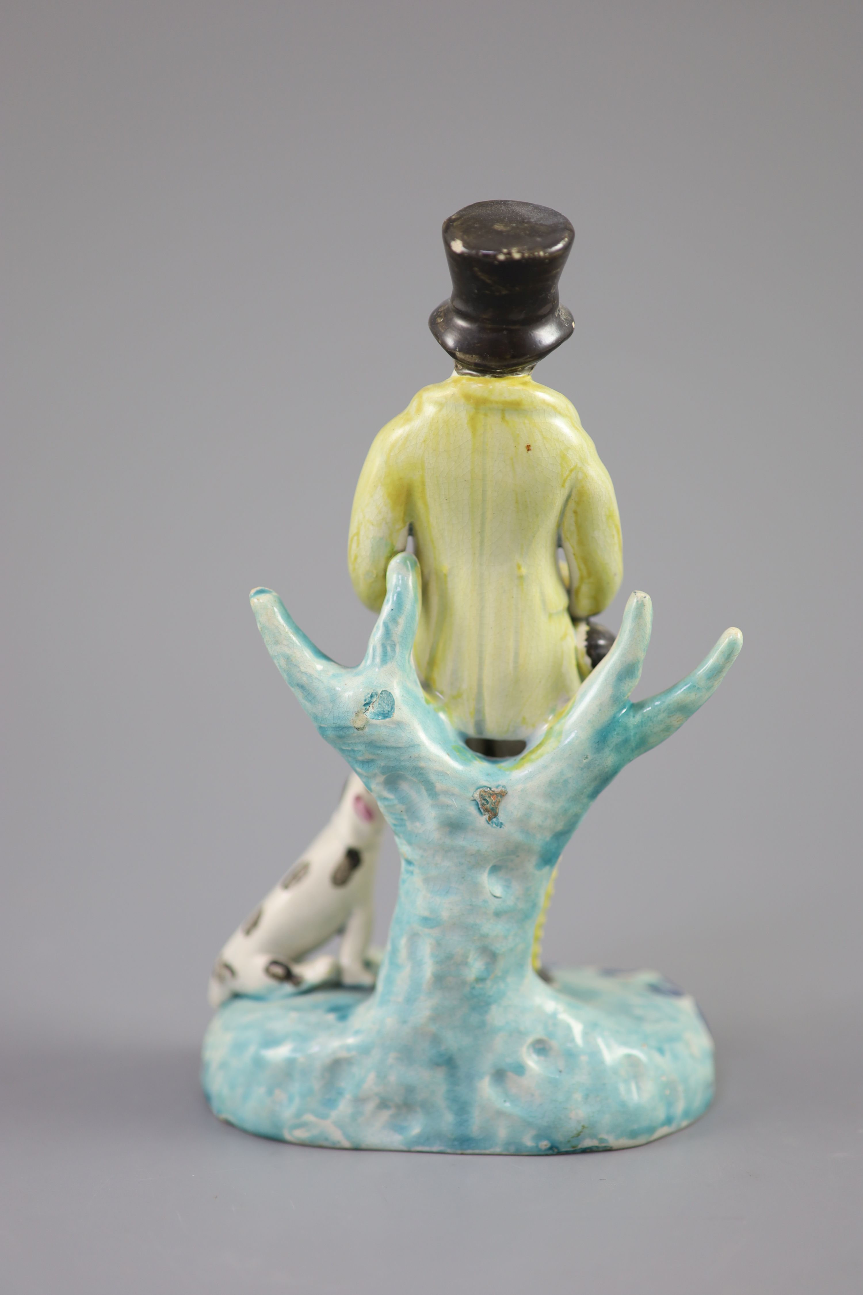 A Staffordshire pearlware group of a huntsman with dog and gun, c.1820-30, on a turquoise and blue - Image 3 of 4