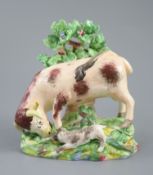 Enoch Wood of Burslem, a pearlware group 'Bull baiting', c.1800-10, the bull standing before