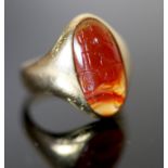 A Victorian 18ct gold and oval intaglio 'two way' agate ring, carved with black and caucasian