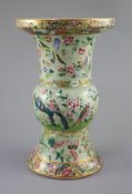 A Chinese Canton decorated celadon ground vase, zun, c.1830, painted in famille rose colours with