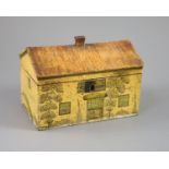 A Regency painted and penwork work box, modelled as a cottage, with leaded windows, plants around