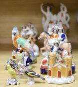 A collection of assorted Staffordshire figures and sundry ceramics including early 19th century