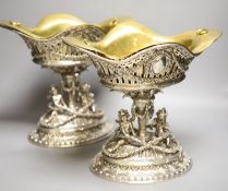 A good ornate pair of late 19th/early 20th century German pierced 800 standard white metal