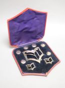 An Edwardian cased set of six silver buttons, belt buckle and pair of shoe buckles, Samuel Jacob,