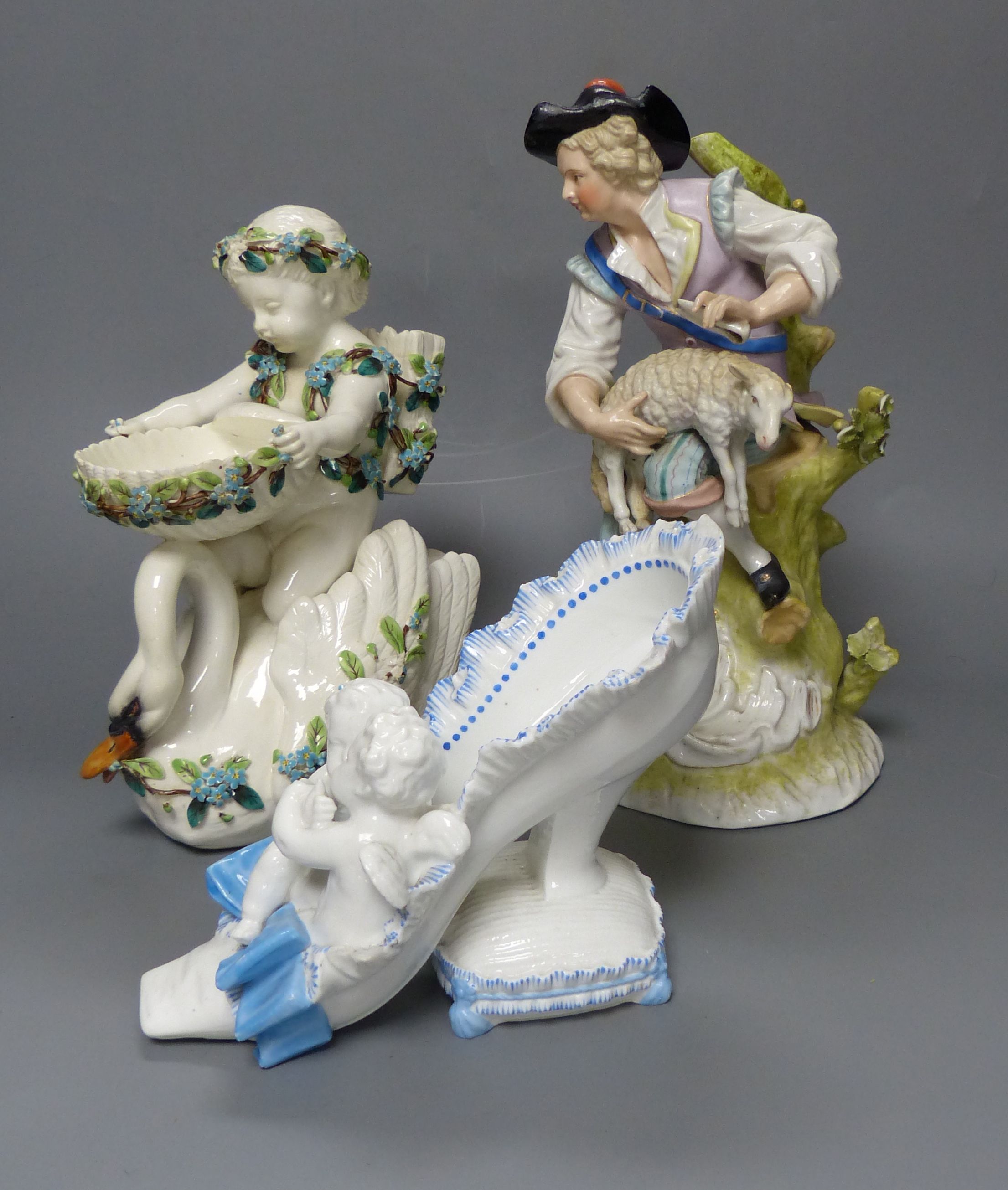 A French porcelain cherub 'shoe', a Continental porcelain cherub and swan dish and group of a - Image 2 of 4