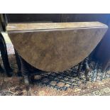 A Victorian walnut Sutherland table, width 89cm depth 17cm height 72cm