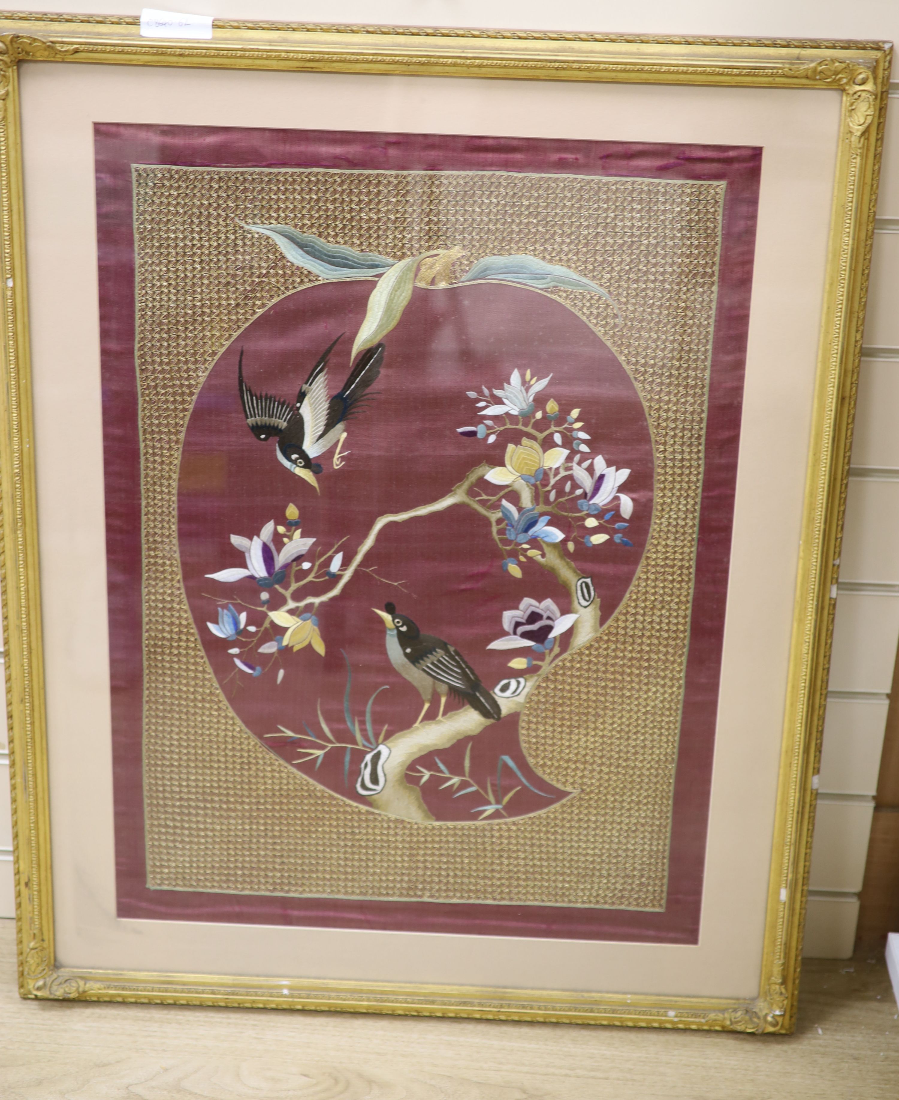 A Japanese silkwork panel of birds on a purple ground, width 48cm to the mounts height 57cm - Image 2 of 2